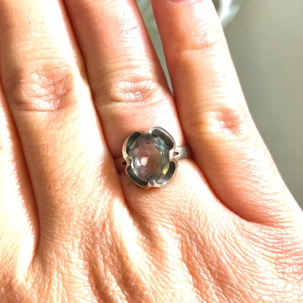 Sterling silver ring w/ green/purple in the center